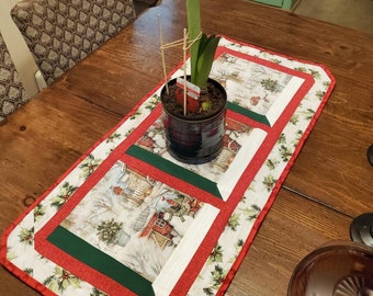 Handmade Quilted Table Runner is insulated for heat protection. Snowman scenes bring a  warm winter feel to your home for the holidays.