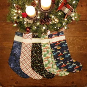 Handmade Christmas Stockings with Cross Stitch Personalization. Stockings are quilted and fully lined.  Large size holds lots of goodies!