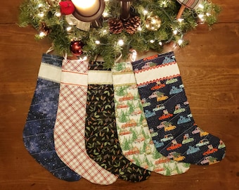 Handmade Christmas Stockings with Cross Stitch Personalization. Stockings are quilted and fully lined.  Large size holds lots of goodies!