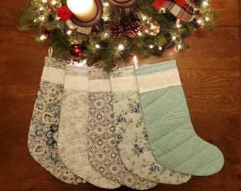 Handmade Christmas Stockings with Cross Stitch Personalization. All stockings are quilted and fully lined. Large size holds lots of goodies!