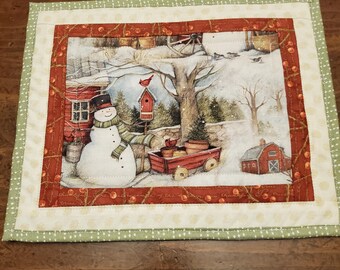 Handmade Quilted Hot Pad Trivets are insulated for heat protection. Winter snowman scene brings the holidays home for you and yours.