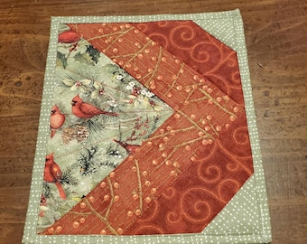 Handmade Quilted Hot Pad Trivets are insulated for heat protection. Winter cardinal scene brings the holidays home for you and yours.