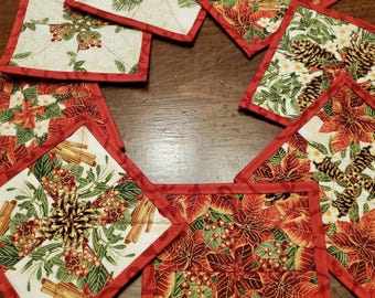 Handmade Quilted Hot Pad Trivets are insulated for heat protection. Kaleidoscope Poinsettia design. No 2 are alike. Creators choice to ship.