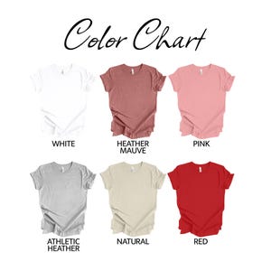 May include: Color chart showing different t-shirt colors: white, heather mauve, pink, athletic heather, natural, and red.