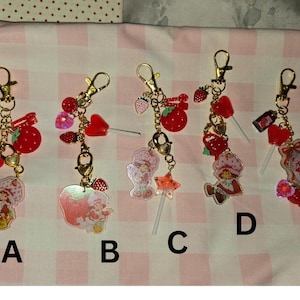 strawberry shortcake and friends bag charms, Stanley cup charms, phone charms