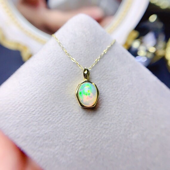 Amazon.com: floating opal pendant, Australian opal pendant, glass flask opal  pendant, raw opal necklace, October birthstone necklace anniversary gift :  Handmade Products