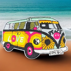 May include: A colorful embroidered patch of a vintage Volkswagen van with the words "Love" and "Peace" on the side. The van is decorated with sunflowers, a yin-yang symbol, and the words "Love Bus".