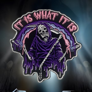 May include: An embroidered patch featuring a purple Grim Reaper with a scythe, dripping with purple and pink paint. The text "It is what it is" is written in a circle around the Grim Reaper.