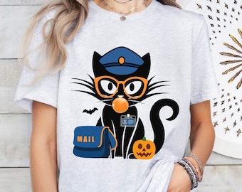 May include: A black cat wearing a blue hat and glasses, holding a bright orange lollipop. The cat is wearing a name tag that says "MAIL" and has a blue bag with the word "MAIL" on it. The cat is sitting next to a jack-o-lantern pumpkin.