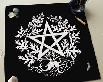 May include: Black cloth with a white pentagram surrounded by a floral design. The pentagram is a five-pointed star with a circle in the center. The floral design is made up of leaves and flowers.