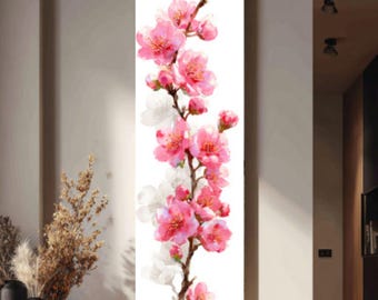 May include: Vertical canvas art featuring a watercolor painting of pink cherry blossoms on a branch against a white background. The artwork includes detailed petals and buds, with a few white blossoms. The painting is displayed in a modern interior setting.