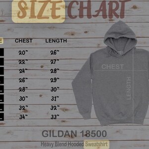 May include: Size chart for a Gildan 18500 heavy blend hooded sweatshirt. The chart shows chest and length measurements in inches for sizes S through 5XL.