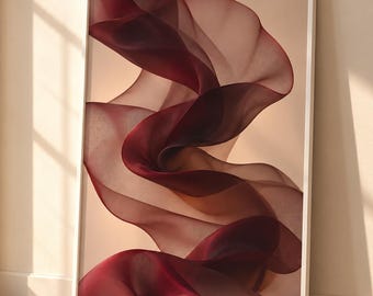 May include: A framed vertical wall art print featuring abstract, flowing, translucent layers of deep burgundy and maroon fabric-like shapes against a soft, light beige background, enclosed in a simple, thin white rectangular frame.