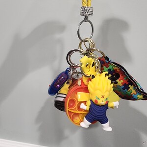 Free STL file PAIR OF DRAGON BALL Z FRIENDSHIP KEY RINGS / KEY