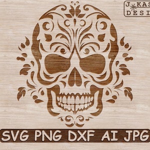Może przedstawiać: Czerwona czaszka wyrzeźbiona w drewnie z misternymi wzorami kwiatowymi. Czaszka jest otoczona ozdobną ramką z liści i kwiat&oacute;w. Obraz zawiera tekst "SVG PNG DXF AI JPG".
