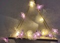 Handmade Butterfly Fairy Lights: Romantic Floral Garland product logo