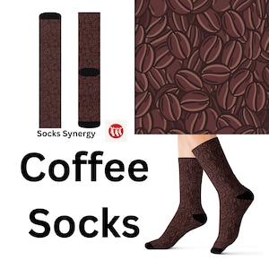 May include: A pair of brown and black socks with a coffee bean pattern. The socks are shown on a model's feet. The text "Coffee Socks" is displayed below the image.