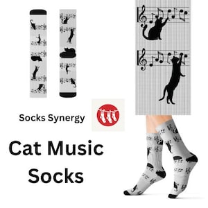 May include: A pair of socks with a black cat design on a white background. The socks feature musical notes and the text "Cat Music Socks".
