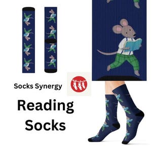 May include: Navy blue socks with a repeating pattern of a cartoon mouse reading a book, wearing green pants and a white shirt. The socks also feature a floral design. The text "Reading Socks" is displayed.