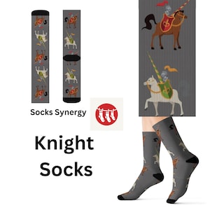 May include: A pair of gray socks with a repeating pattern of knights riding horses. The socks are shown on a model's feet. The socks are called "Knight Socks" and the brand is "Socks Synergy".