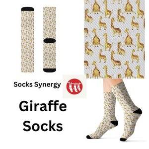 May include: Giraffe socks with a repeating pattern of yellow giraffes on a white background. The socks have black heels and toes. The text "Socks Synergy" and "Giraffe Socks" is also visible.