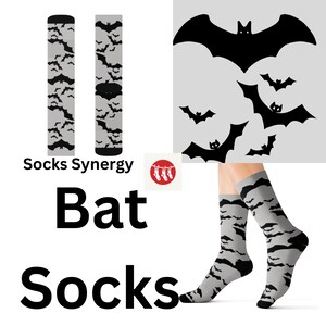 May include: A pair of grey socks with a black bat pattern. The socks are shown on a model's feet. The image also shows a close-up of the sock pattern and a single black bat silhouette. The text "Socks Synergy" and "Bat Socks" is also included in the image.