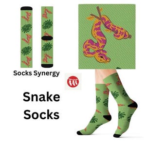 May include: Green socks with a repeating pattern of a snake, tropical leaves, and a snake design. The socks have black heels and toes. The text "Snake Socks" is displayed below the socks.
