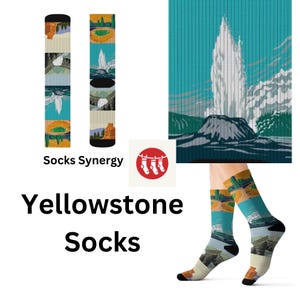 May include: A pair of crew socks featuring a multi-panel graphic print of Yellowstone National Park landscapes, including geysers, waterfalls, and rock formations in shades of blue, green, orange, and brown, shown flat and worn on feet.