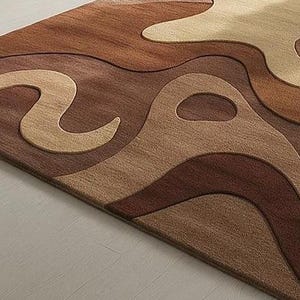 Modern abstract area rug with organic curves and wavy design in warm tones of brown, tan, and cream. Handcrafted with sculptural wool texture, perfect for U.S. contemporary homes.