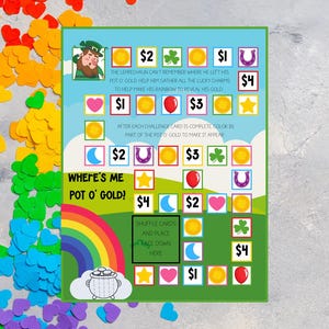 May include: A green game board with a rainbow and a pot of gold. The board has a leprechaun and various symbols like hearts, stars, moons, and horseshoes. The text on the board reads "Where's Me Pot O' Gold!" and "Shuffle Cards and Place Face Down Here".