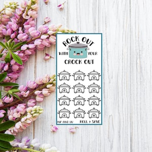 May include: A white rectangular sticker with the text "Rock Out With Your Crock Out" and a cartoon crockpot. Below are 12 small crockpot illustrations. Pink and purple flowers are on the left side.