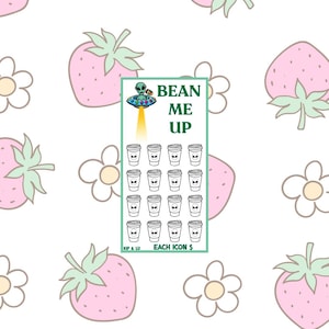 May include: A white background with a pattern of pink strawberries and white flowers. A green and white rectangle features an alien in a spaceship beaming up coffee cups, with the text "BEAN ME UP".