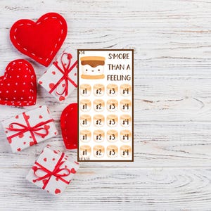 May include: A white card with a brown border and the text "S'MORE THAN A FEELING" in black. The card has a cartoon image of a s'more with a smiling face. There are 20 small squares on the card, each with a number from 1 to 4.