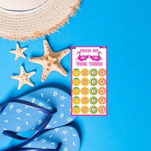 May include: A pink and white game card with the text "Show Me Your Tubes" and a grid of 20 colorful circles with numbers 1, 2, 3, and 4.