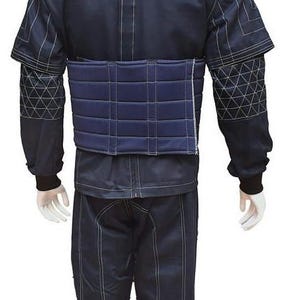 May include: Navy blue protective suit with white stitching. The suit features a jacket with quilted shoulder pads and matching trousers. A padded belt is worn around the waist. The suit is displayed on a mannequin.