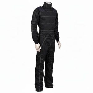May include: A black long-sleeved jumpsuit featuring a high mock neck collar and prominent white contrast stitching throughout the garment. The design includes structured shoulder panels, fitted cuffs, and reinforced seams on the legs and torso.