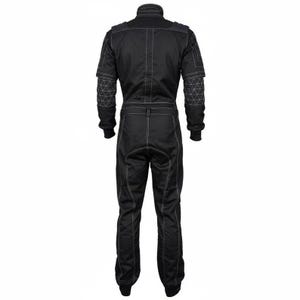May include: A black jumpsuit featuring long sleeves and full-length trousers with prominent white contrast stitching throughout. The garment includes a high collar, a fitted waist, and geometric triangular patterns stitched onto the upper sleeves.