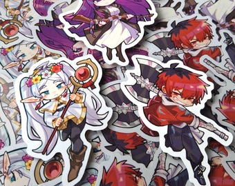 May include: A collection of anime-style stickers featuring various characters. One sticker depicts a character with purple hair holding a staff, another with red hair wielding an axe, and a third with white hair and a floral crown.