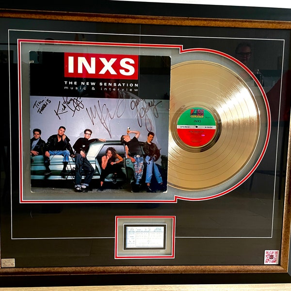 INXS fully signed Record Album.  Includes Michael Hutchence. Includes a concert ticket from the era and a Gold Record. COA.