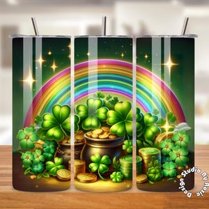 May include: A green tumbler with a rainbow, shamrocks, and gold coins. The tumbler is decorated with a St. Patrick's Day theme.
