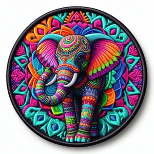 May include: A colorful embroidered patch featuring an elephant with intricate patterns in shades of pink, blue, green, and orange. The elephant is surrounded by a mandala-like design.