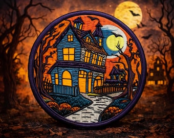 May include: Embroidered patch featuring a spooky haunted house scene. The design includes a blue house with orange lit windows, a full moon, bats, and bare trees against an orange and black sky. The patch is circular with a purple border.