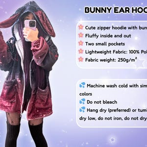 May include: A red and black hooded sweatshirt with bunny ears. The hoodie has two pockets and a zipper closure. The text "BUNNY EAR HOODIE" is at the top of the image. The text below the hoodie description reads: "Cute zipper hoodie with bunny ears. Fluffy inside and out. Two small pockets. Lightweight Fabric: 100% Polyester. Fabric weight: 250g/m&sup2;. Machine wash cold with similar colors. Do not bleach. Hang dry (preferred) or tumble dry low, do not iron, do not dry clean."