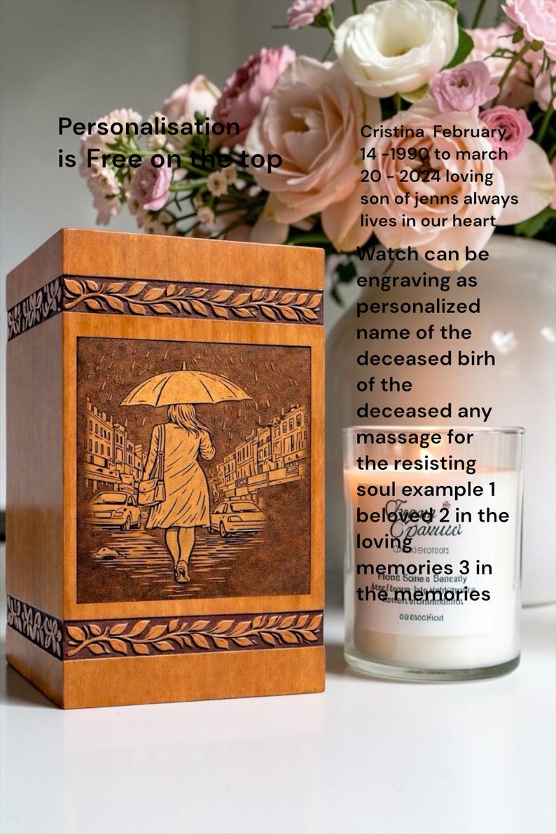 Unique engraved wooden cremation urn box with umbrella rain memorial artwork symbolizing remembrance and reflection. Crafted with precision from natural wood, this funeral urn features decorative carved borders and a rich finish. Designed as a memorial keepsake box to respectfully store ashes and honor the memory of someone special.