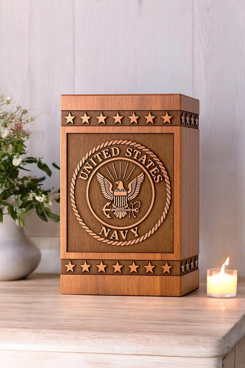 Handcrafted rosewood urn box with custom US Navy logo silhouette engraving. Personalized memorial urn for ashes, ideal for Navy veterans. Custom engraved keepsake box available in multiple sizes.
Custom engraved rosewood urn box with US Navy logo silhouette for memorial ashes.

Personalized US Navy urn box, handcrafted with US Navy logo engraving