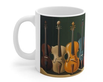 May include: A white ceramic mug featuring a graphic print of four stringed instruments, including a dark brown violin, a light tan cello, a golden-yellow cello, and a blue-grey double bass, arranged side-by-side against a dark green background.