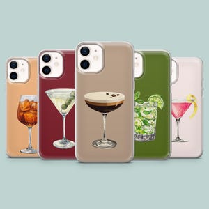 May include: A collection of phone cases featuring watercolor illustrations of cocktails. The cases showcase a variety of drinks, including a martini with olives, a mojito with lime, and a coffee cocktail with coffee beans.