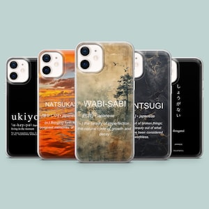 May include: Five different phone cases with various designs and Japanese words and their definitions. The designs include a sunset, a forest, a marble pattern, and a black background with Japanese text. The words are "Natsuka", "Wabi-Sabi", "Ntsugi", and "Ukiyo".
