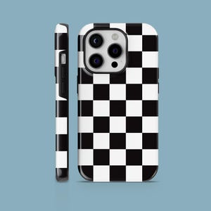 May include: A smartphone case featuring a high-contrast black and white checkered pattern. The design covers the entire back and side edges of the case, which includes a rectangular cutout for a triple-lens camera system and side buttons.