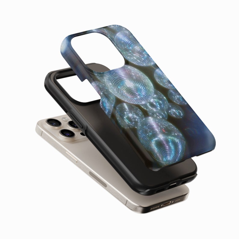 May include: A black phone case with a design of silver disco balls on a dark blue background. The case is designed to fit an iPhone 13 Pro.